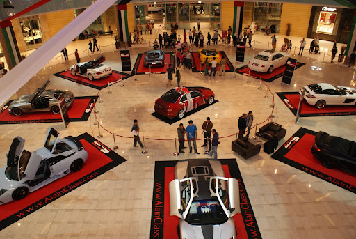 exhibit of customized exotic cars at the main entrance of Dubai Mall.