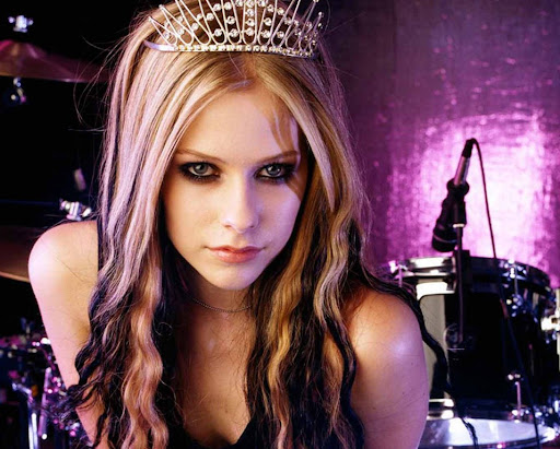 listening Goodbye Lullaby album by Avril Lavigne eating pretzel cinnamon