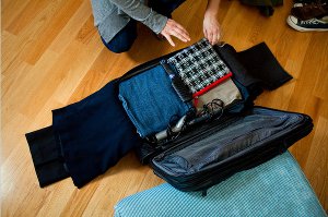 Packing a suitcase for a short trip Packing a suitcase for a short trip
