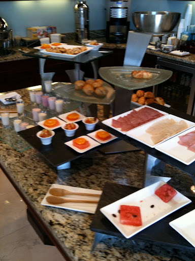a buffet table with different food items on it