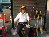 street performer playing the Erhu