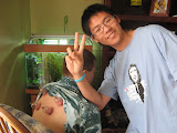Sean performing accupressure on Scott