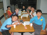 The boys working on an activity at English class