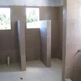 Bathroom stalls and showers to accommodate large groups.