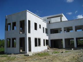 The new Makarios house, under construction and with just a coat of very white primer. Back/North side.