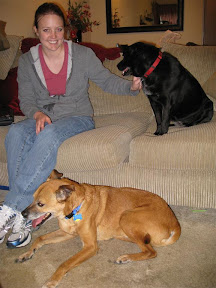 Lauren and our "spoiled" dogs at home in the States.