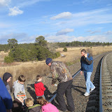 Squishing coins on the railroad.