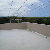 Roof with solar powered clothes dryer.