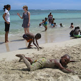 Elijio rolling in the sand!