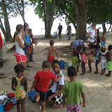 Lining up for the beach!  Step 1: take off shoes and shirts