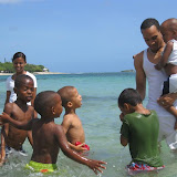 Willi, Elijio, Antony and David trying to convince Jemsy the water is a fun place to be.