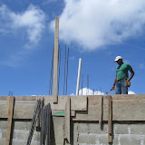 Carpentar getting ready for the roof.