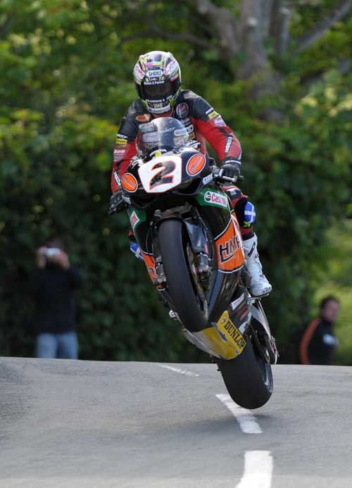John McGuiness powers to 15th TT win.jpg