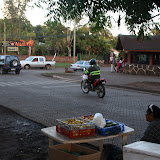 Locals shop for their produce early at the market and the truck vendors