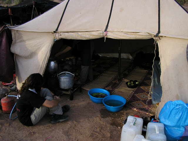 The kitchen tent. Billie observes Berber cooking.