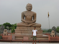 In front of a statue of Mahavir, Delhi.