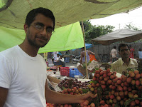 Picking some leechi, Delhi