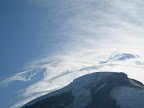Very strong wind gusts at camp, and heavy winds viewable at the summit... summit attempt is off.