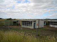 Portable classroom graveyard, outside Kyneton.