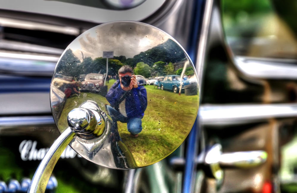 [photographer's reflection in the back of a classic car mirror copy[11].jpg]