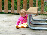 She loved the yellow sticker on the picnic table