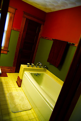 Second floor full bath.  Eventually well build up a wall so we can add a shower curtain.  For now, its just a tub with a little hand shower thingy - but its nice.