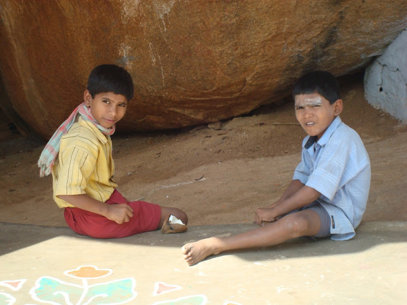 Children busy eating coconut at Siddaganga Mutt Children busy eating coconut at Siddaganga Mutt