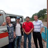 Friendly locals in Siberia who help us find the way to our destination