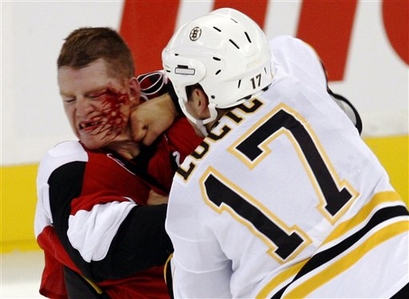 2009/09/25 - Milan Lucic vs Chris Neil