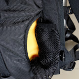 This pouch can be used to either carry a small bottle or it can also be used to carry a tripod which is also secured towards the top