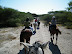 All mounted and heading out of the corral.