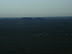 Shadowy Kgwebe with some exploration pads in the foreground.