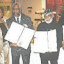 -Photo by Amir Akbar
United States Congresswoman Yvette D. Clarke (2nd l) presents proclamations to (l-r) Tony Ryan, Winston Blake and Ken Williams, Jr on Saturday, (February 2) at the 3rd Annual Dennis Brown Memorial Scholarship and Awards Dinner held at the Ramada Adria Hotel in Bayside, New York. Clive Williams, publisher of Where It At magazine looks on. -Photo by Amir Akbar
United States Congresswoman Yvette D. Clarke (2nd l) presents proclamations to (l-r) Tony Ryan, Winston Blake and Ken Williams, Jr on Saturday, (February 2) at the 3rd Annual Dennis Brown Memorial Scholarship and Awards Dinner held at the Ramada Adria Hotel in Bayside, New York. Clive Williams, publisher of Where It At magazine looks on.