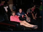 Maureen and Paul lounging at the movies