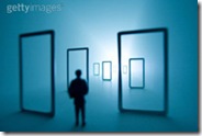 Man-standing-in-front-of-doors