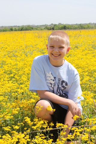 [Zach in yellow flowers 2[2].jpg]