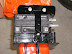 Top of battery box with battery and retention strap in place. MSS