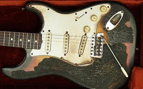 [jimi-hendrix-guitar_burnt[4].jpg]