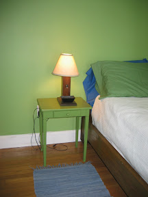 The lampshade and the petite nightstand have got to go!