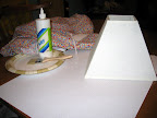 Materials: Fabric, craft glue, disposable paint brush, double-fold bias tape, scrap paper for pattern tracing