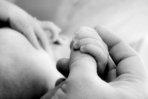 [1111673_little_baby_hands_with_mom_and_dads_hands_3[4].jpg]