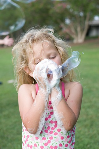 [Erika blowing bubbles with hands blog[6].jpg]