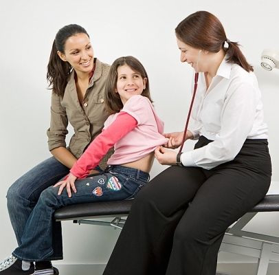 Consulting A Doctor On Child’s Bed Wetting