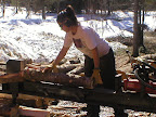 Our great friend Stephanie helps split some wood.