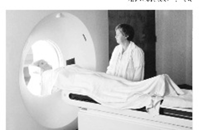 Patients undergoing nuclear magnetic resonance image (MRI) examinations are placed inside cylindrical chambers in which their bodies are held rigidly in place. (Digital Stock)