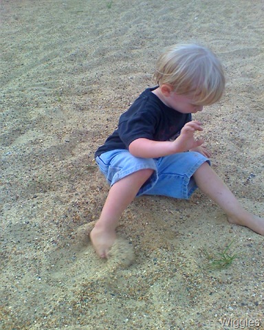 [Aaron in the sand at playground[5].jpg]