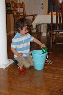 Quinn checking out his Easter bucket.