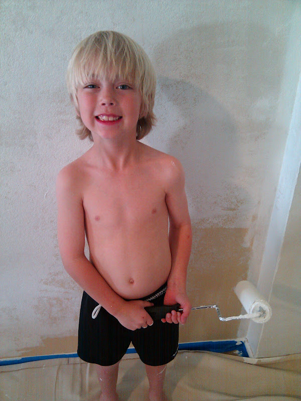 Xander painting the walls