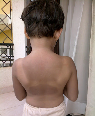 Thaïs' tanned back