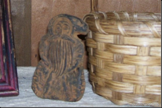 blackened beeswax Santa closeup
